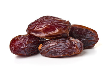 Raw Organic Medjool Dates, isolated on white background.