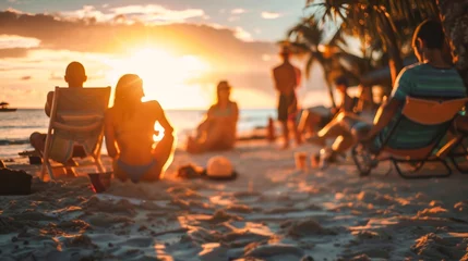 Fotobehang Group of friends enjoying tropical beach while sitting and admiring sunset © Radomir Jovanovic
