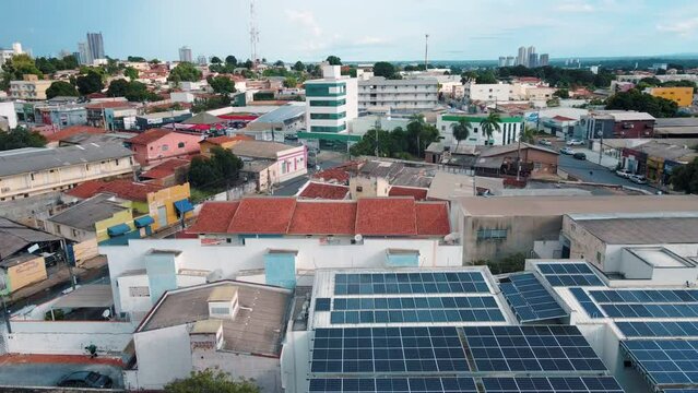 Aerial city scape with solar panel roofs in summer in central Cuiaba Mato Grosso