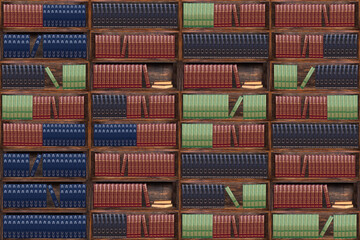 Books on the bookshelves in the library. Dark wood bookcase.