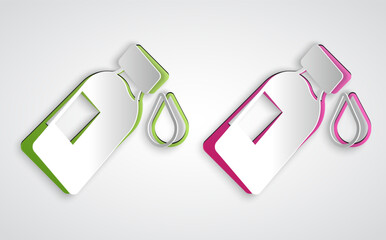 Paper cut Bottle of water icon isolated on grey background. Soda aqua drink sign. Paper art style. Vector