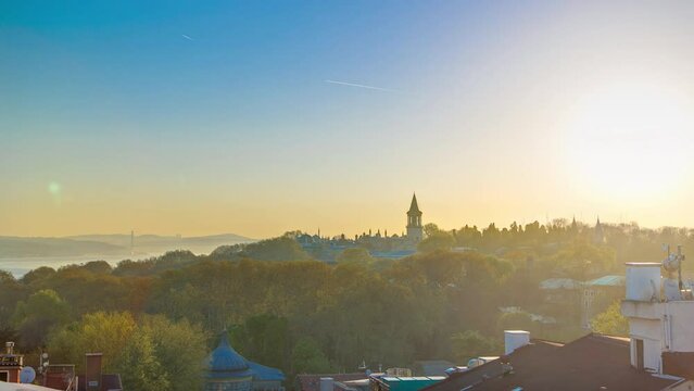 Beautiful Sunrise over Istanbul from top with Bosphorus Bridge and Topkapi Palace Museum timelapse. Istanbul - Turkey. Aerial view from sultanahmet downtown at clear spring morning