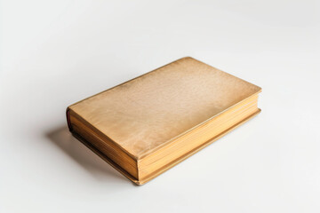 Fototapeta premium Old hardcover book with a textured cover isolated on a white backdrop