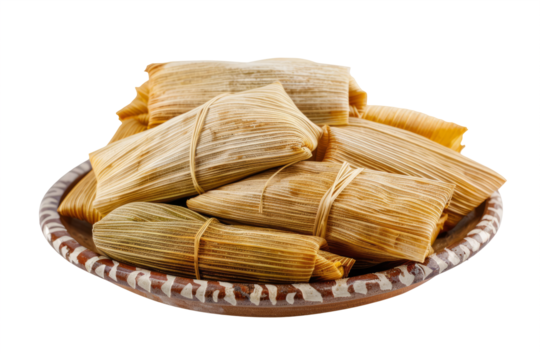 traditional Mexican tamales filled with savory pork and wrapped in corn husks, isolated on a clean white background.