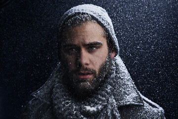 Snow, night and man with portrait outdoor in winter with storm, ice and travel with fashion for...