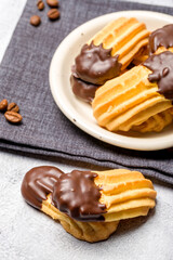 Chocolate shortbread cookies. Light background. Selective focus