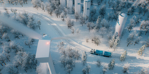 A truck with a hydrogen filling device, hydrogen storage tanks and a wind farm captured from a bird's eye view in the middle of a snowy forest. 3D rendering