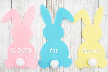 Closed for Eater sign with a bunny and on weathered wood