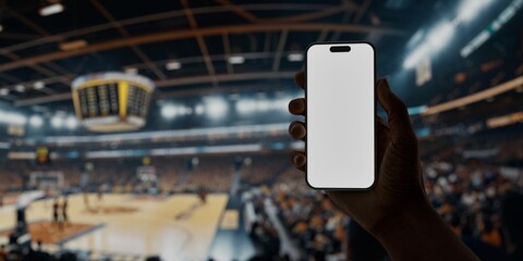 Black African-American man using smartphone during a game on basketball arena - obrazy, fototapety, plakaty