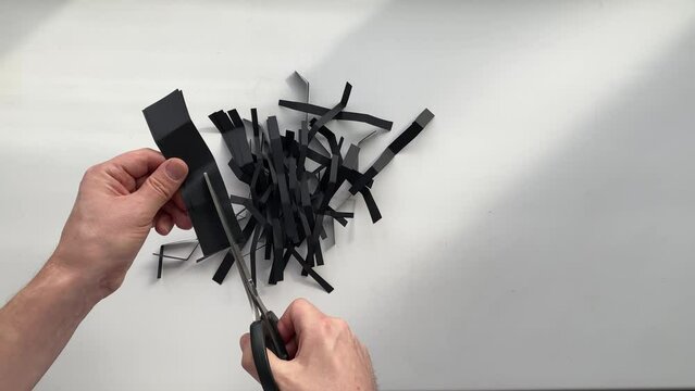 do it yourself. cut paper. slow motion video. High-quality 4K shooting