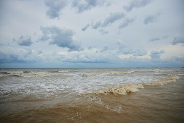 The sea or the ocean during a storm. Dirty sea waters. High waves