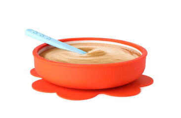 Tasty baby food and spoon in bowl isolated on white
