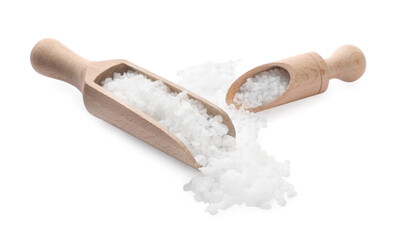 Natural salt and wooden scoops isolated on white