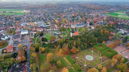 Aerial of the old town in the city Bad Bentheim  on an overcast day in autumn in Germany.	