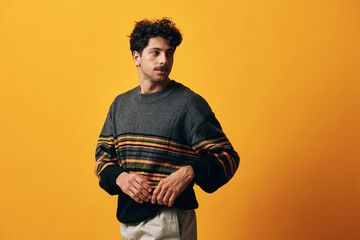 Man orange trendy happy fashion background sweater portrait
