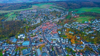 Aerial view around the old town of the city Idstein on a cloudy day in autumn in Germany.


