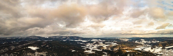 Panorama aerial view of the Poprad Landscape Park on the Poprad River in Beskid Sadecki on a sunny,winter day.