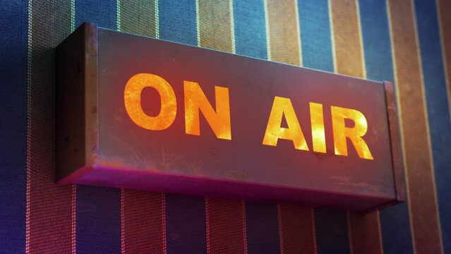 Electronic display showing red light message ON AIR