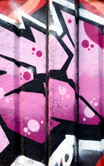 Colorful background of graffiti painting artwork with bright aerosol outlines on wall. Old school...