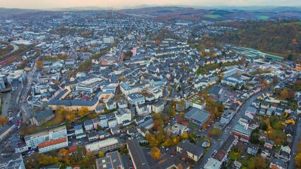 	
Aerial view around the old town of the city  Siegen in Germany on a cloudy day in autumn	
