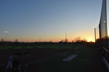 Sunset Over a Baseball Field