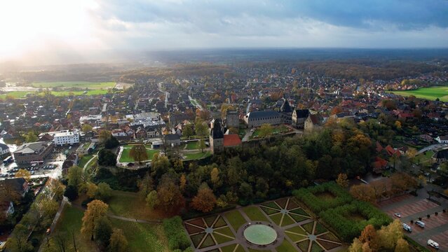 Aerial view of the old town around the city Bad Bentheim on an overcast day in fall in Germany.	