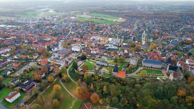 Aerial view of the old town around the city Bad Bentheim on an overcast day in fall in Germany.	