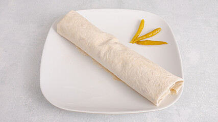 Durum kebab on plate top view