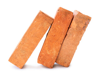 Side view of cracked old red or orange bricks in stack isolated with clipping path and shadow in png file format