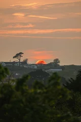Foto auf Acrylglas sunset over the village © Trang
