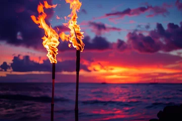 Tuinposter Hawaii sunset with fire torches © Fabio