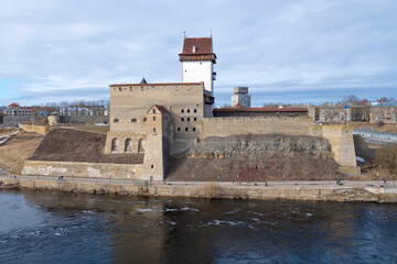 View of the ancient Hermann Castle on a sunny March day. Narva, Estonia - 759850802