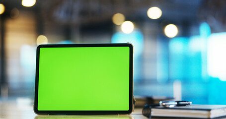 Digital tablet with green screen on the desk in the office	 - 759854491