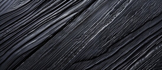 Obraz premium Black faux wood vinyl with wood plastic composite panels for interior and exterior wall decor.