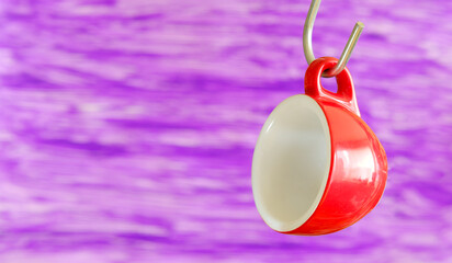espresso coffee cup, hanging in front of purple background, coffee,hot drink,espresso,coffee shop, concept, large free copy space - 759867011