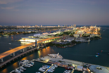 Miami marina bay with luxury sailboats. Expensive yachts and motorboats docked in Biscayne Bay...