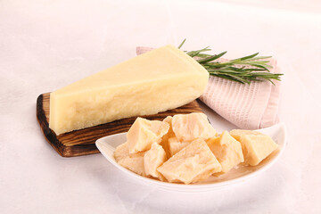 Chopped Italian hard parmesan cheese