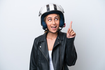 Young caucasian woman with a motorcycle helmet isolated on white background thinking an idea pointing the finger up