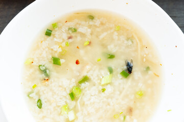 House fly, food contamination hygiene concept.The flies in boiled rice are insect carriers of diarrhea.Dirty food.