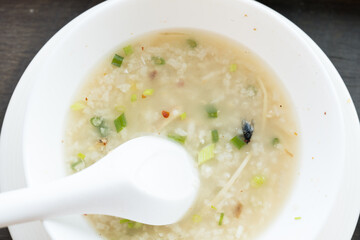 House fly, food contamination hygiene concept.The flies in boiled rice are insect carriers of diarrhea.Dirty food.