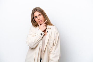 Young caucasian woman isolated on white bakcground having doubts