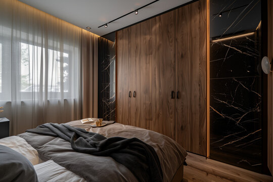 Modern beddroom furniture. wooden wardrobe with black marble doors. High quality photo
