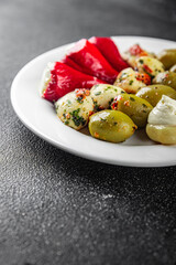 vegetable antipasti mix olives, mozzarella, stuffed pepper, mushroom  vegetarian food antipasto fresh food tasty appetizer meal food snack on the table copy space food background
