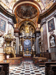 Obraz premium The chancel, apse, and altar of St Francis of Assisi Church in Prague. Construction was completed in 1688.