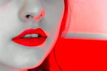 Fototapeta premium Close-up of vibrant red lips exuding a sense of bold, passion, and sensuality.