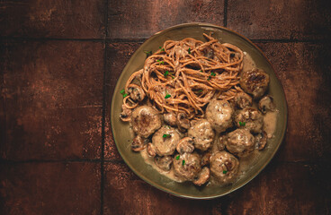 Spaghetti with meatballs and mushrooms, in cream sauce, homemade, no people,