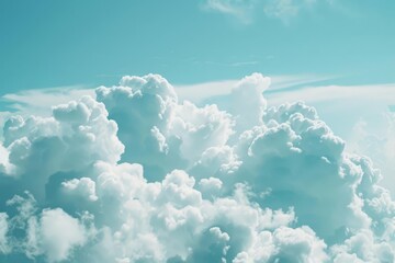 Soft white clouds against a bright blue sky Providing a dreamy and serene atmosphere for peaceful and uplifting content