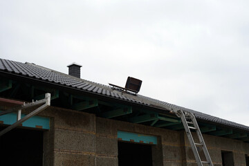 A seat for workers, which is located on the roof of the new building.