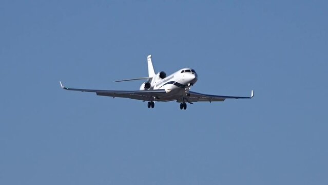 Business Aircraft Jet Private Executive Corporate Slow Motion Landing Final Approach into Airport Airfield arrival arriving