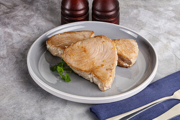 Roasted red tuna steak in the plate